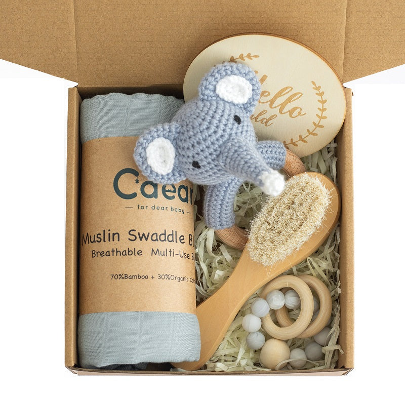 Dubai Online baby shop uae - newborn gift set - swaddle blanket teether rattle milestone wood plaque organic wooden hair brush for Easter - welcome baby gift best baby shower gift Dubai متجر دبي أونلاين للأطفال في الإمارات العربية المتحدة - مجموعة هدايا لحديثي الولادة - قماط وبطانية عضاضة وخشخيشة وفرشاة شعر خشبية عضوية لعيد الفصح - هدية ترحيبية للطفل، أفضل هدية لحفل استقبال المولود الجديد دبي