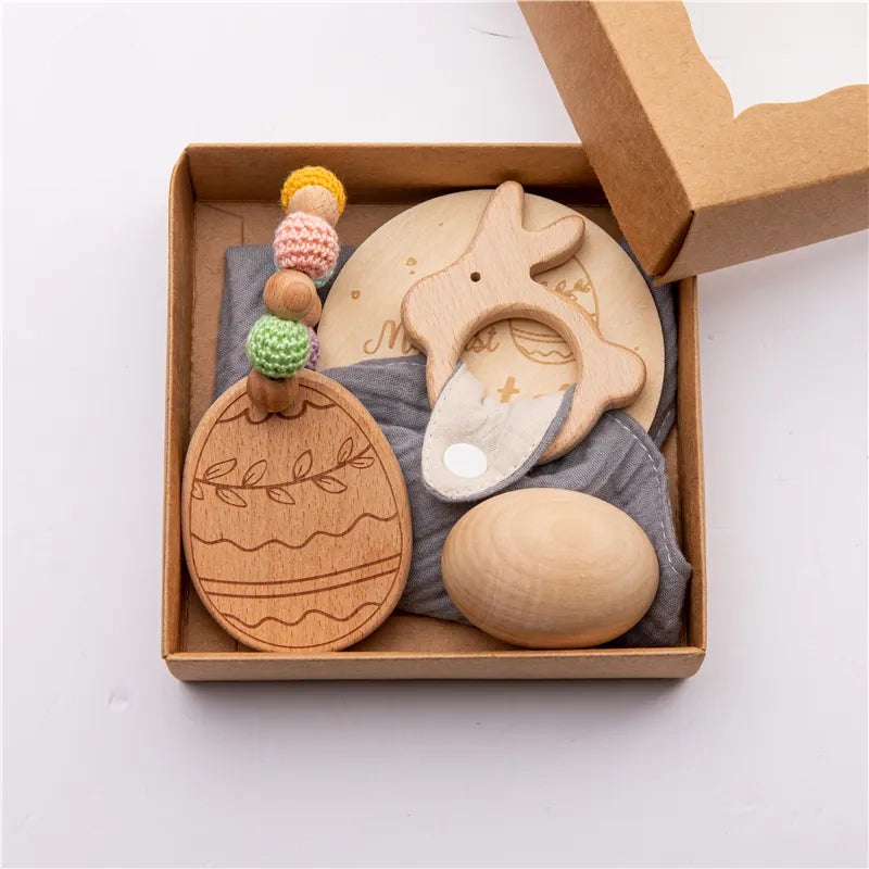 Dubai Online baby shop uae - newborn gift set - swaddle blanket teether rattle milestone wood plaque organic wooden egg for Easter - my first Easter متجر دبي أونلاين للأطفال في الإمارات العربية المتحدة - مجموعة هدايا لحديثي الولادة - قماط وبطانية عضاضة وخشخيشة ولوحة خشبية وبيضة خشبية عضوية لعيد الفصح - عيد الفصح الأول