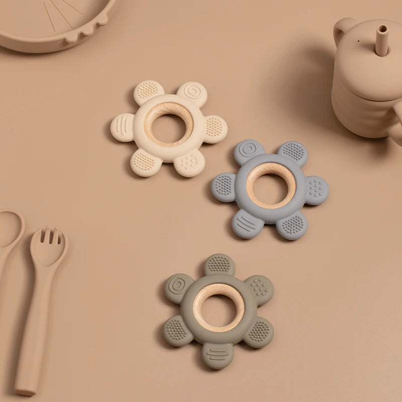 ergonomic design Silicone ring teether BPA-Free Baby Silicone Teether with Wooden Ring!  Crafted from 100% food-grade silicone and natural wood, tvariety of textures to stimulate your baby's senses.