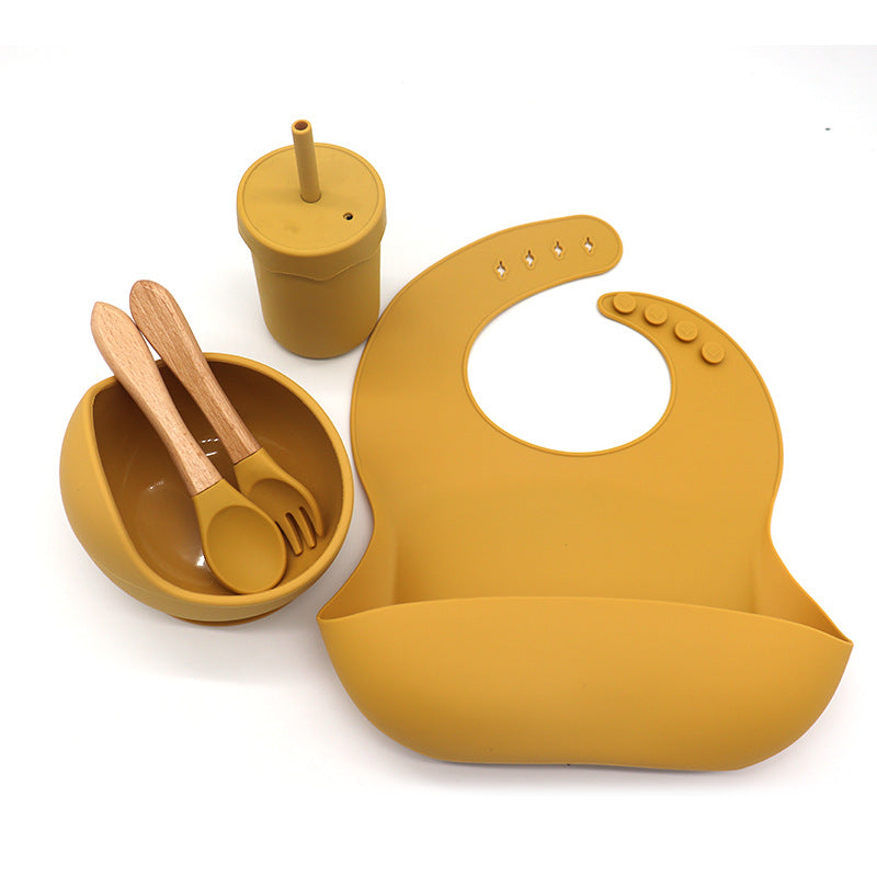 Waterproof silicone bib, cup with a straw, bowl, fork and spoon set for babies kitchen essentials طقم مريلة سيليكون مقاومة للماء وكوب مع شفاطة ووعاء وشوكة وملعقة لمستلزمات مطبخ الأطفال